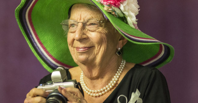 Grandmother at a wedding taking pictures